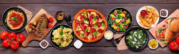 istock Table scene banner with various delicious foods 1472818280