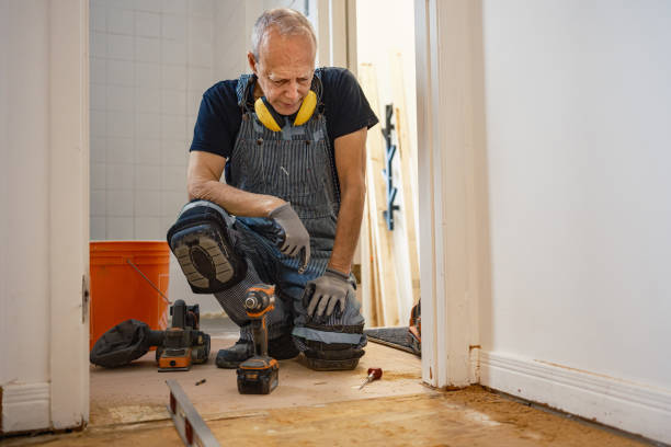 istock Senior Caucasian man doing construction renovation indoors 1472823609