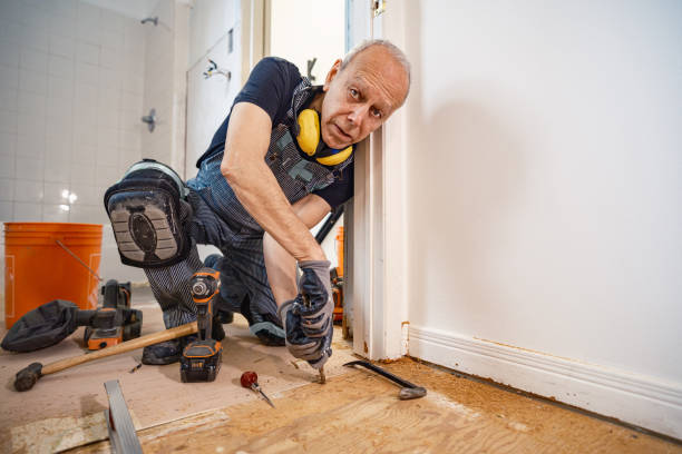istock Senior Caucasian man doing construction renovation indoors 1472823688