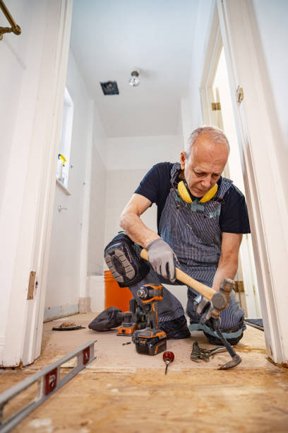 istock Senior Caucasian man doing construction renovation indoors 1472823716