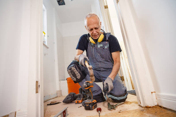 istock Senior Caucasian man doing construction renovation indoors 1472823760