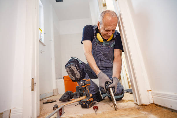 istock Senior Caucasian man doing construction renovation indoors 1472823762