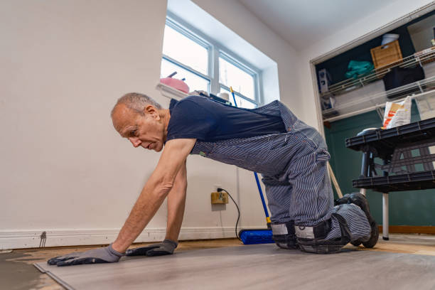 istock Senior Caucasian man doing construction renovation indoors 1472824329