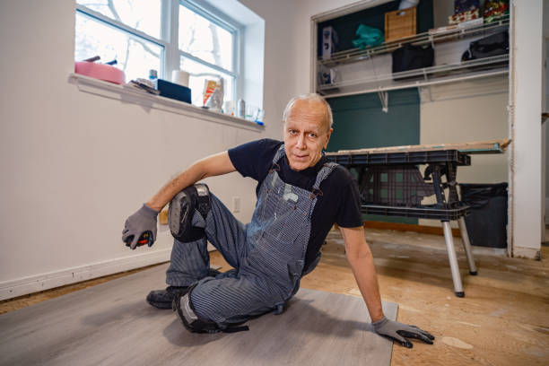 istock Senior Caucasian man doing construction renovation indoors 1472824465