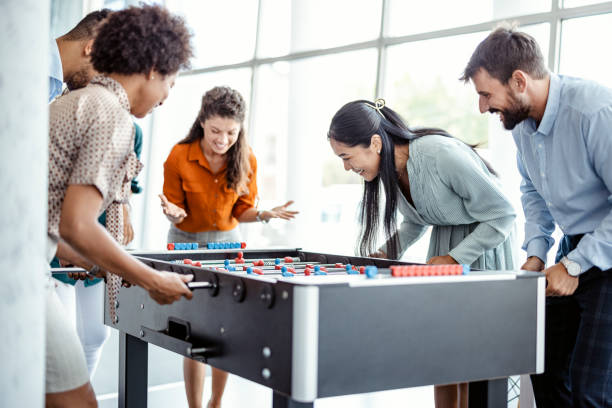 istock Business People Playing Table Football 1472824685