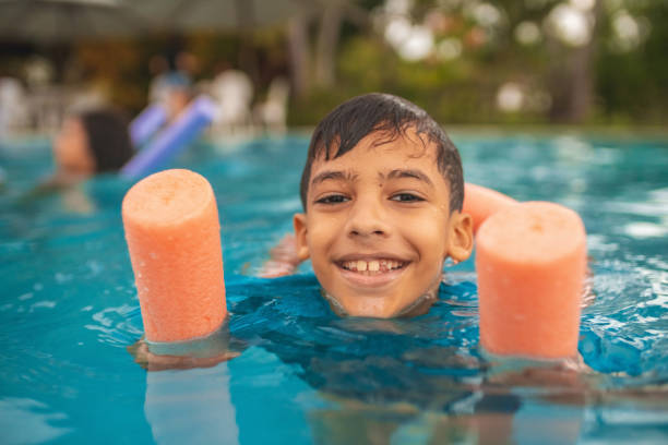 Top view of foam swimming tube and plastic balls as hydrotherapy tools for exercises the Parkinson Disease patients. This is one of treatment methods to improve the condition of Parkinson disease patients and slow down its advancement.