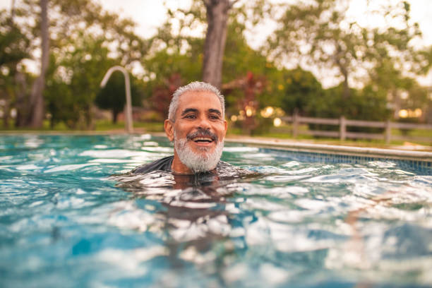 istock Gray man in the pool 1472826804