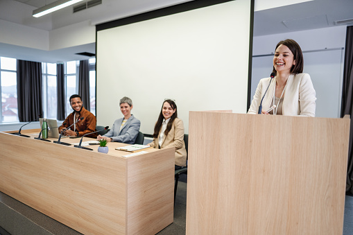 Business leader gives a speech to colleagues