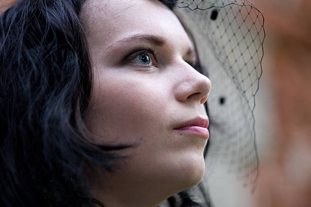 Young gothic style brunette stock photo