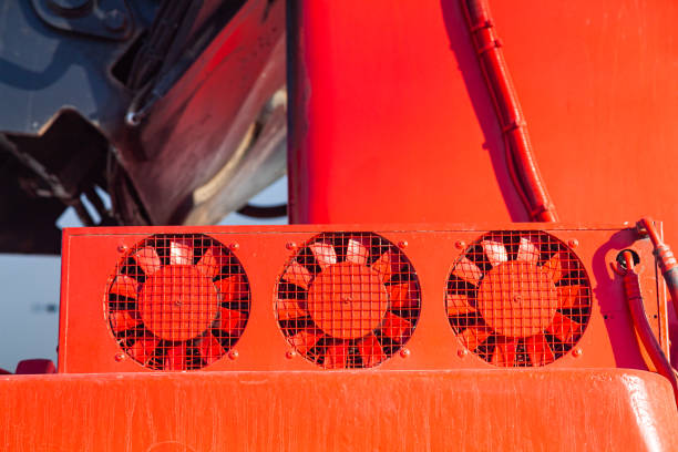 istock Three red industrial fans on the loading equipment. 1472829206
