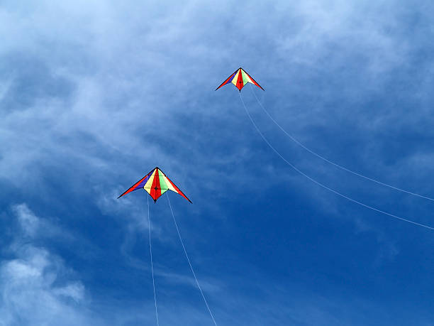 Two kites in the sky stock photo