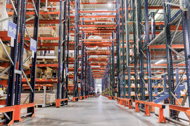 istock Modern warehouse for storing goods with many shelves. 1472835313
