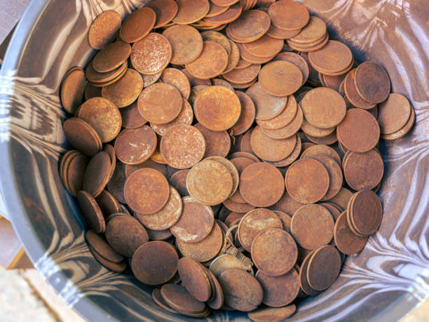 Heap of coins on display at a street market
