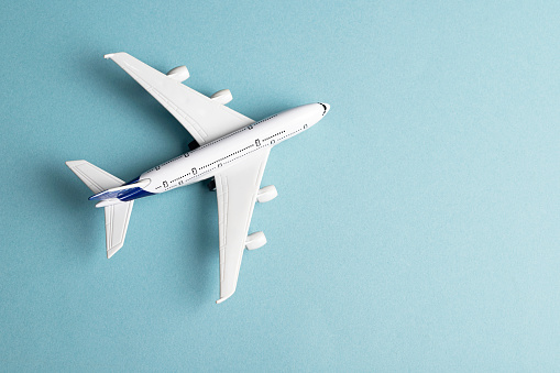 Airplane model on blue background