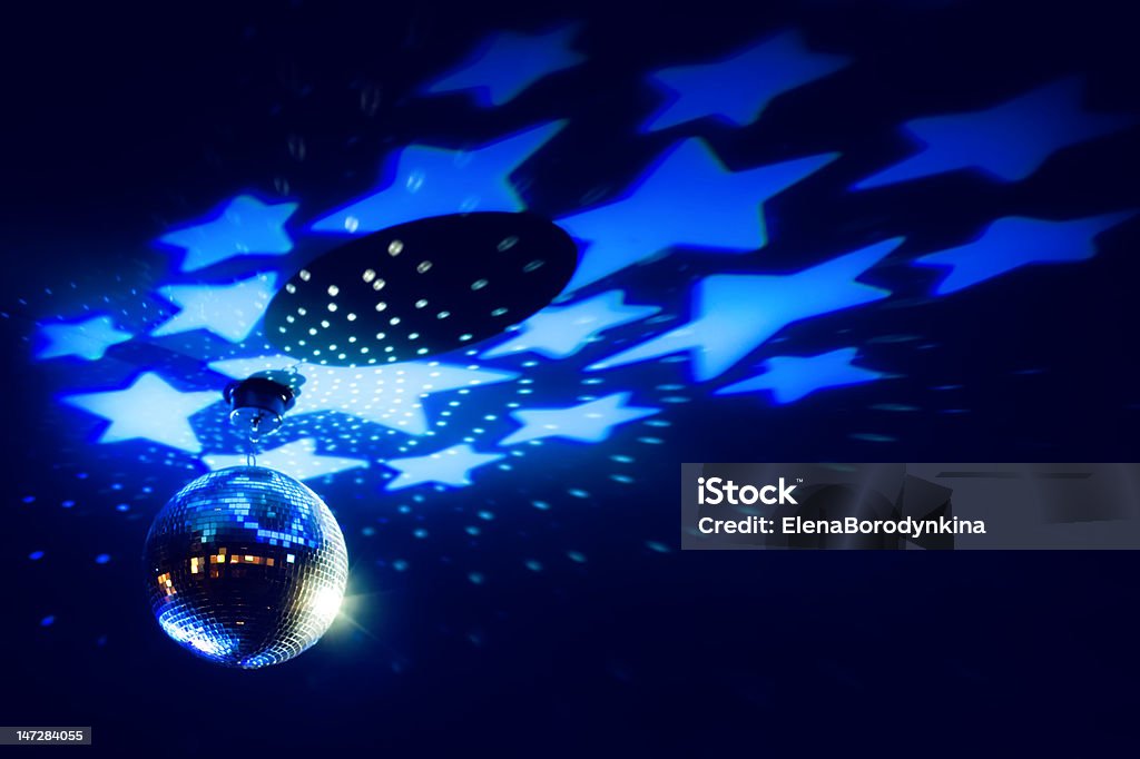 Disco ball with a bright blue stars Arts Culture and Entertainment Stock Photo