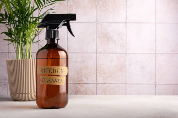 istock Spray bottle of kitchen cleaner on tile background 1472845777