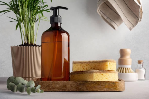 istock Set for cleaning, as dish wash brush, dispenser bottle and sponge 1472845832