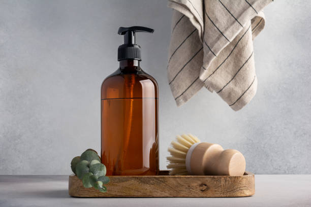 istock Set for cleaning, as dish wash brush and dispenser bottle 1472845862