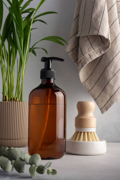 istock Set for cleaning, as dish wash brush and dispenser bottle 1472845867