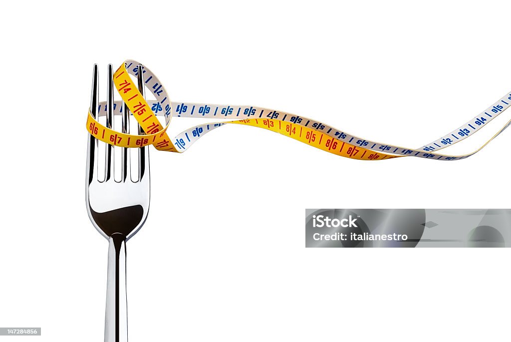 Diet concept represented with a fork and measuring tape fork and measuring tape over white background to dieting for a healthy lifestyle Balance Stock Photo