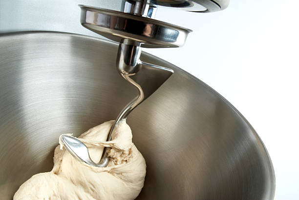 kneading dough stock photo