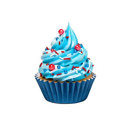 Blue buttercream birthday cupcake with red sprinkles icing isolated on a pure white background