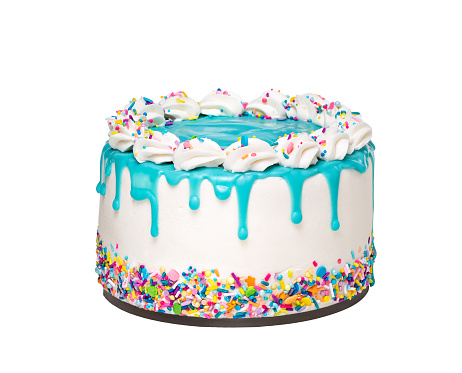 Vanilla buttercream birthday cake with a teal blue ganache drip and colorful sprinkles isolated on a pure white background. Trendy.