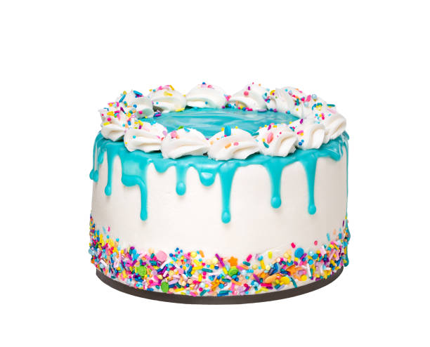 birthday cake with a blue ganache drip and colorful sprinkles isolated on a white background - copy space single object confetti nobody imagens e fotografias de stock