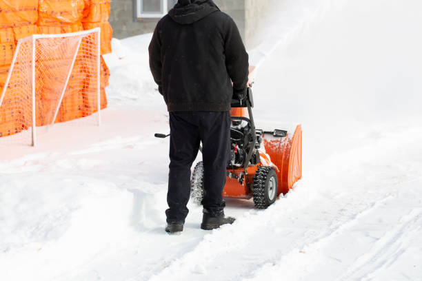 istock A portable snow blower powered by gasoline. 1472850416