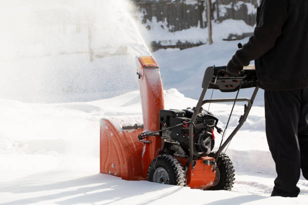 istock A portable snow blower powered by gasoline. 1472850443