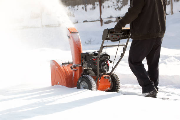 istock A portable snow blower powered by gasoline. 1472850458