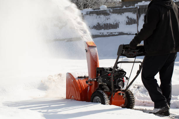 istock A portable snow blower powered by gasoline. 1472850489