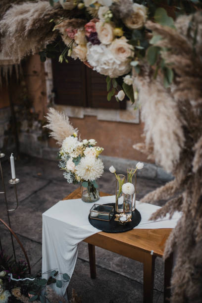 istock Rustic decoration with flowers and candles. 1472852402