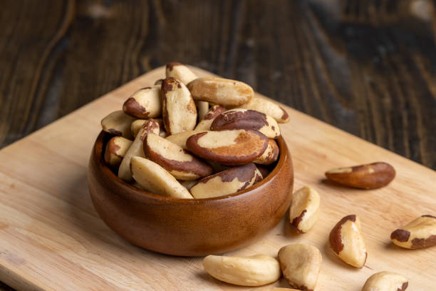 istock Fresh Brazil nuts peeled from the shell on the table 1472861723