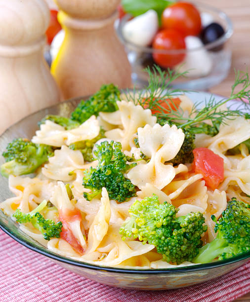 istock italian pasta with brocoli and tomato 147286339