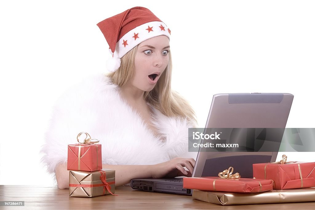 expressive femme en Chapeau de Père Noël - Photo de Adulte libre de droits