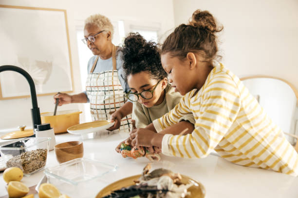 istock Girls helping grandmother 1472865325
