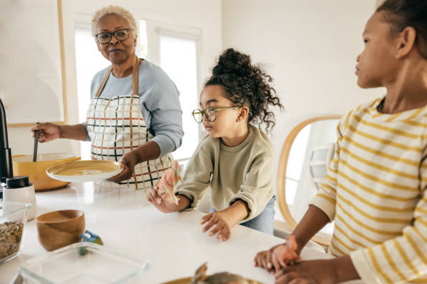 istock Cooking together with grandmother 1472865329