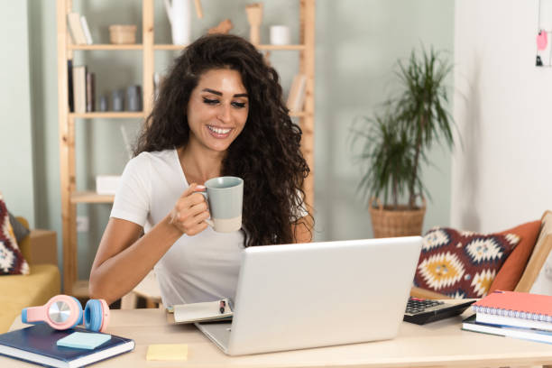 istock Student girl studying in her room 1472865558
