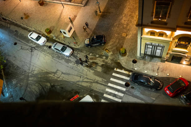 istock Urban life.POV, looking from tall building window. 1472865681
