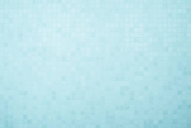 Blue light ceramic wall chequered and floor tiles mosaic background in bathroom, kitchen. Design pattern geometric with grid wallpaper texture decoration pool. Simple seamless abstract surface clean.