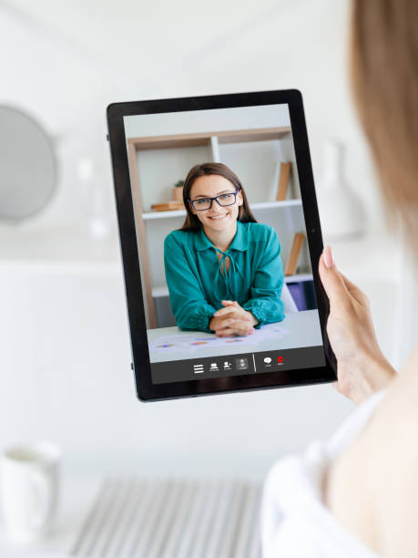 istock video talk female friends speaking online tablet 1472865918