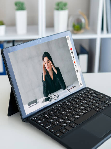 istock web call work fatigue tired business woman laptop 1472865938