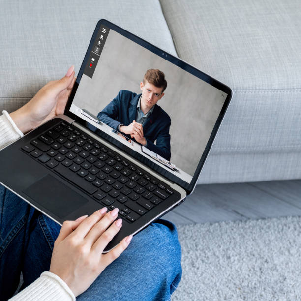 istock video chat employee working from home on laptop 1472865940