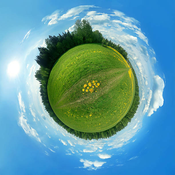 Green panorama globe This is a 360 degree view of a green field that I have morphed into a globe. fisheye lens stock pictures, royalty-free photos & images