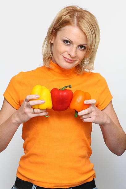 istock woman and paprikas 147287259