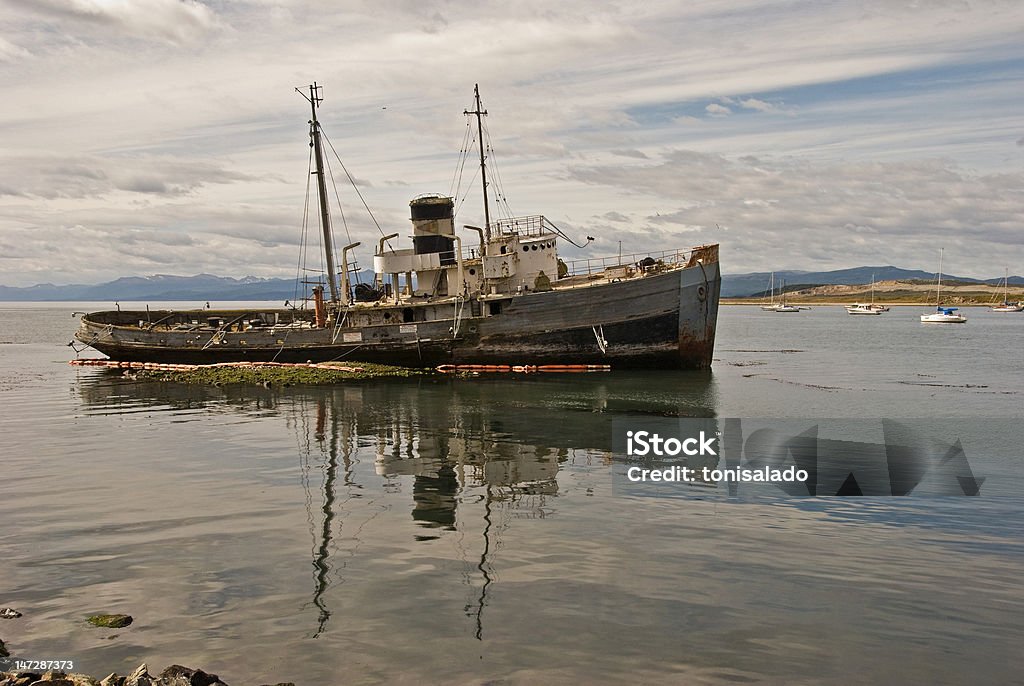 Sunken ship Photo of a sunken ship off the coast of Ushuaia, Argentina. Nikon d-80 camera. Antarctic Peninsula Stock Photo