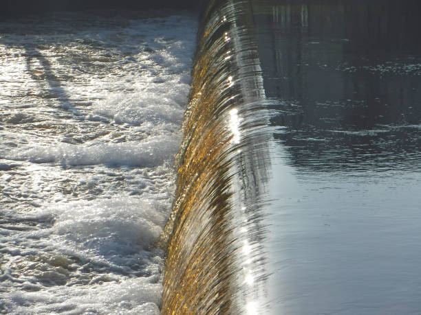 istock Water weir across the width of a river 1472878605