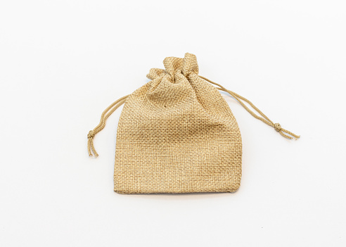 A jute bag for gifts isolated on a white background.