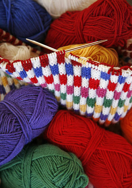 istock Knitting a Colorful Sweather 147288424